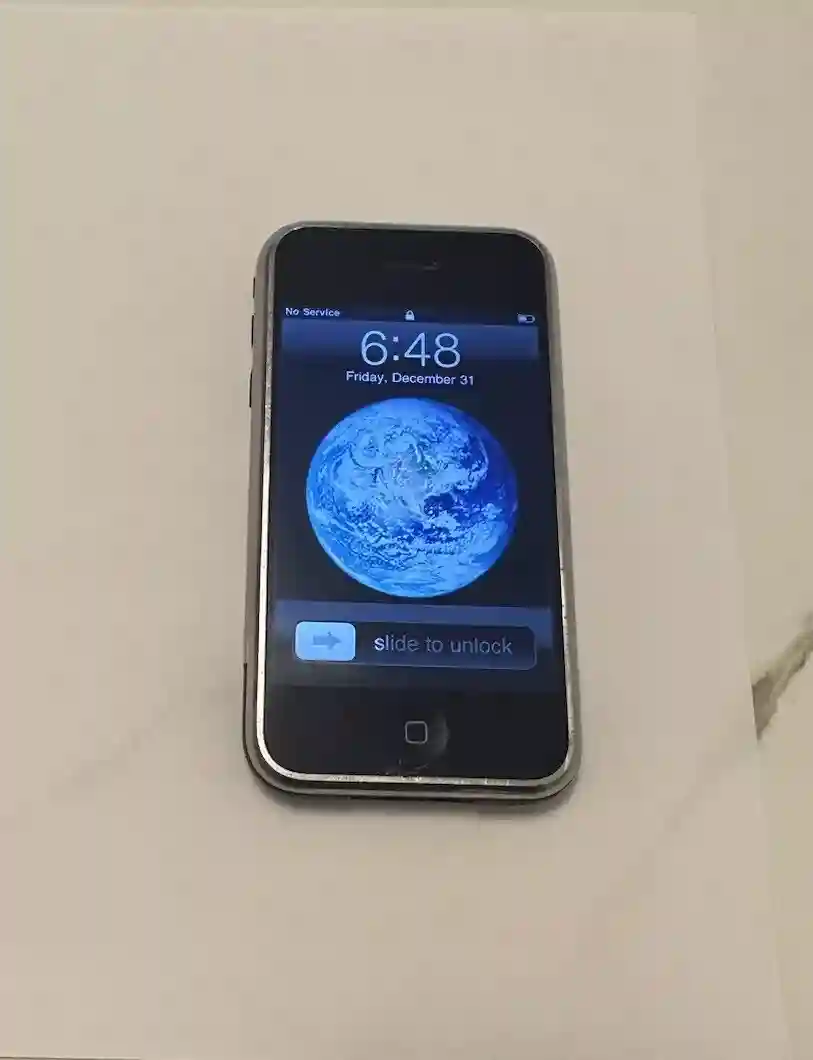 New ListingApple iPhone 1st Generation - 8GB - Black (AT&T) A1203 (GSM) C60